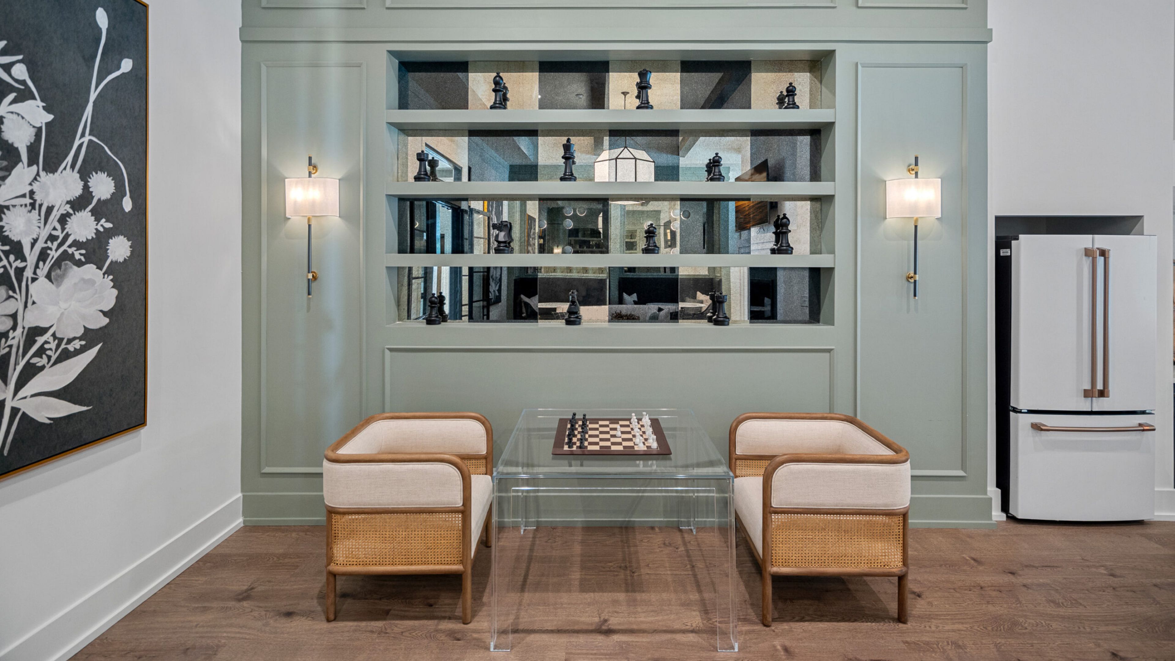 Hawthorne at Traditions apartment kitchen area with wrap around kitchen island, stainless steel appliances, and ample cabinet storage