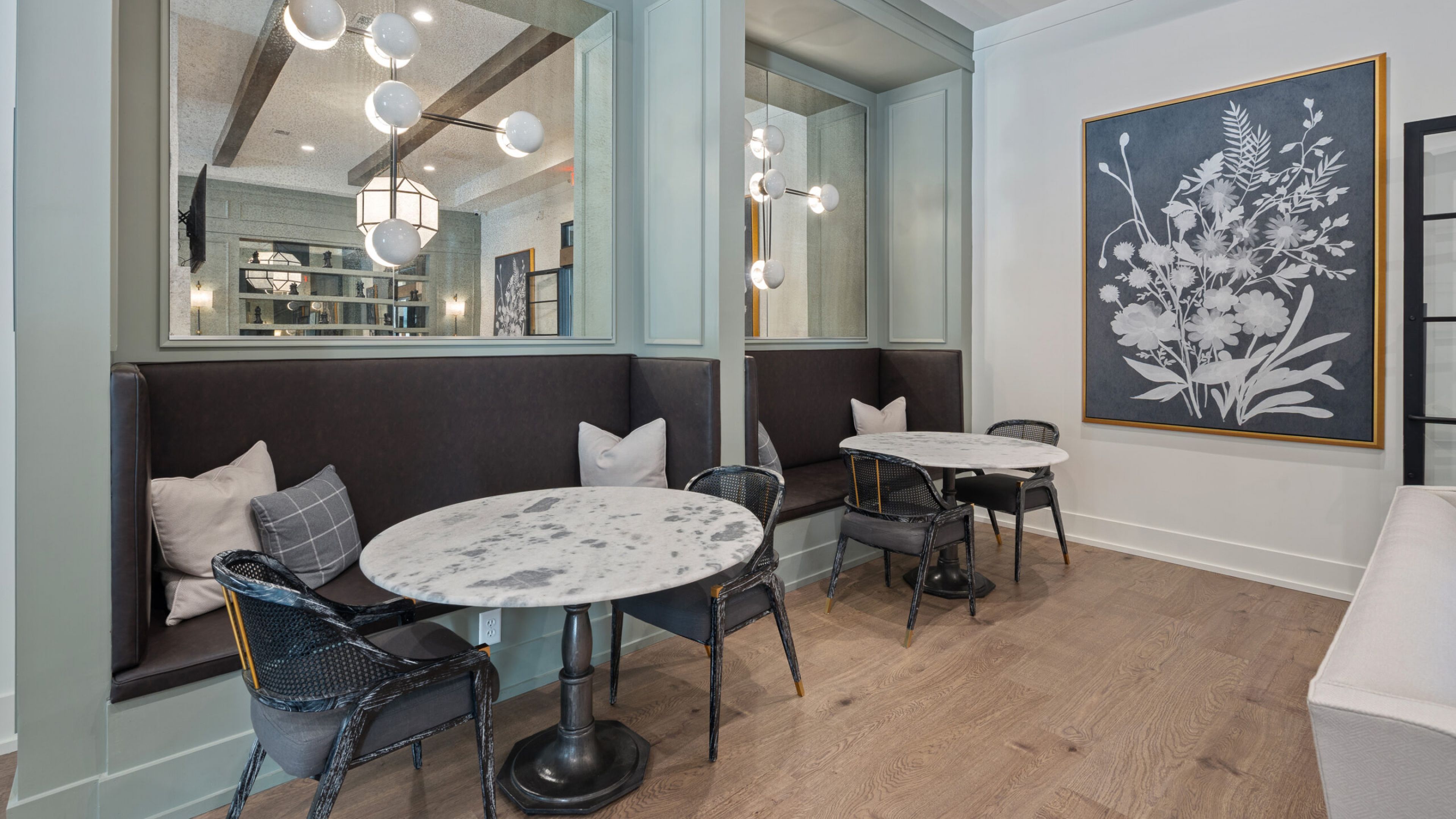 Hawthorne at Traditions smiling young man relaxing at home and using tablet